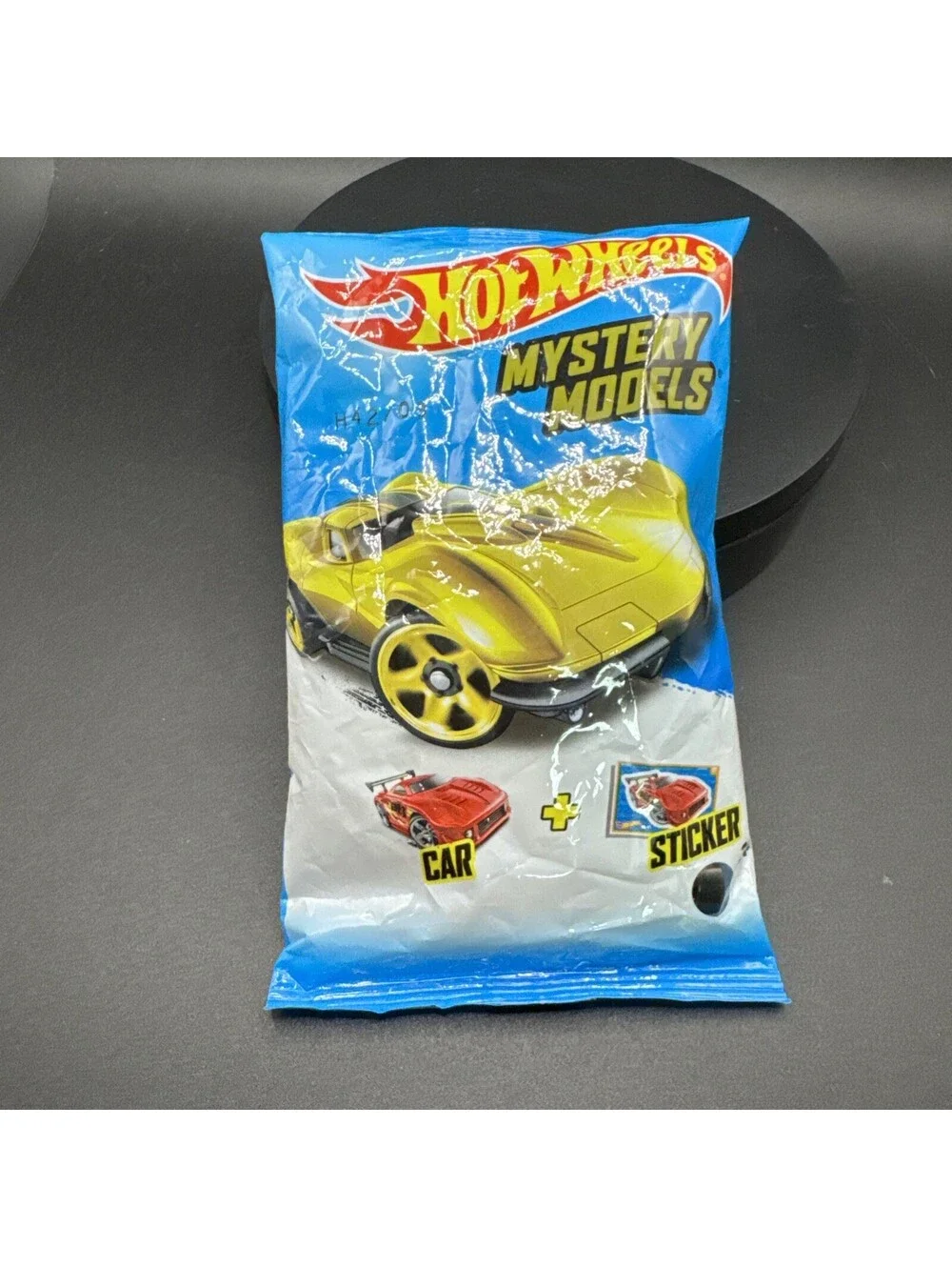 2014 Hot Wheels Mystery Models Car & Sticker - Unopened